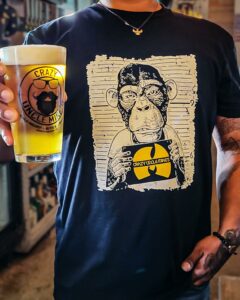 T shirt with monkey mugshot that says Crazy Uncle Mike's